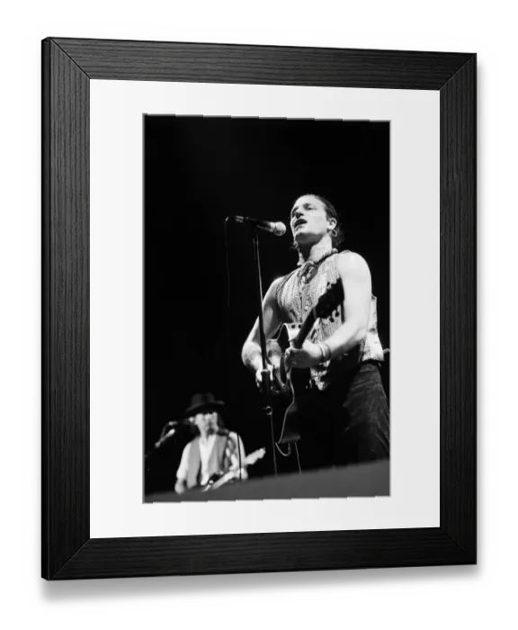 Framed Print : Rock group U2 performing on stage at the National Exhibition Centre in Birmingham Framed Print : Rock group U2 performing on stage at the National Exhibition Centre in Birmingham