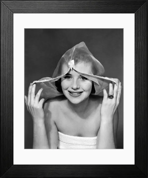 Framed Print : Ann Cave, model, poses with a make up mask, 29th October 1957