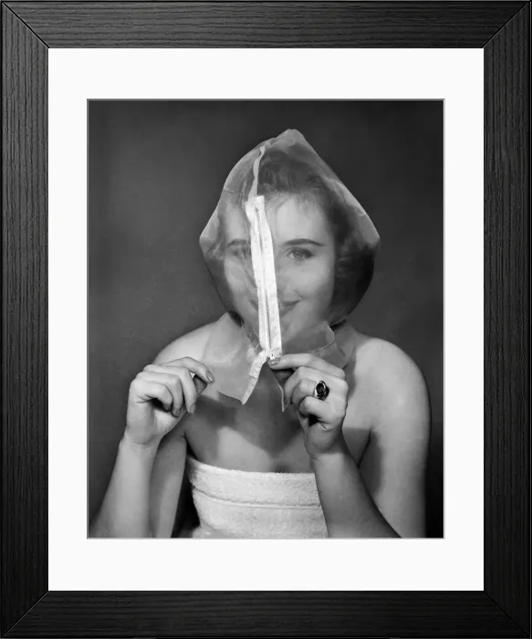 Framed Print : Ann Cave, model, poses with a make up mask, 29th October 1957