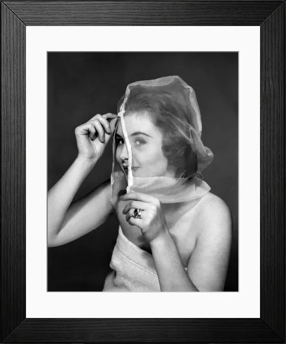 Framed Print : Ann Cave, model, poses with a make up mask, 29th October 1957