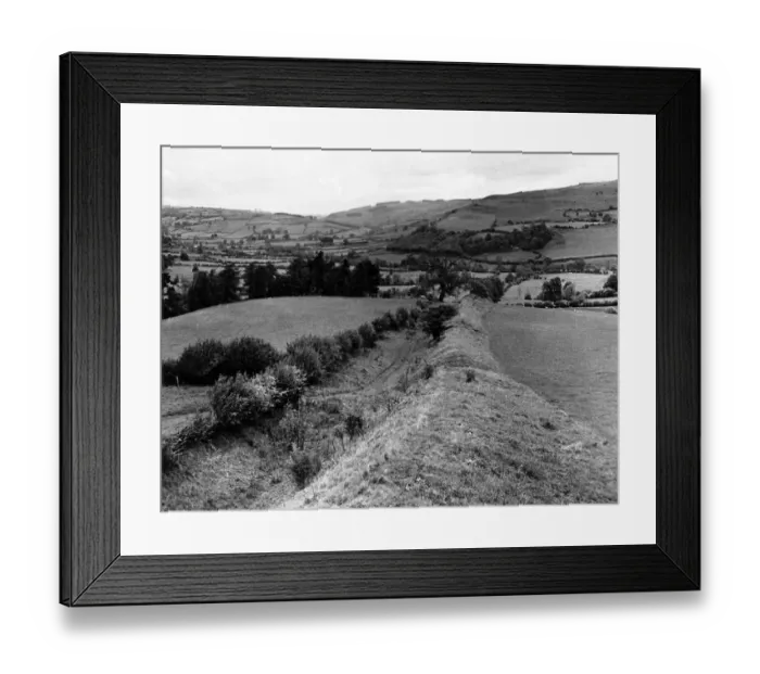 Framed Print : Offas Dyke is a large linear earthwork that roughly follows the current border
