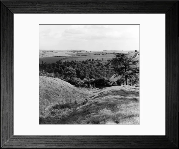 Framed Print : Offas Dyke is a large linear earthwork that roughly follows the current border