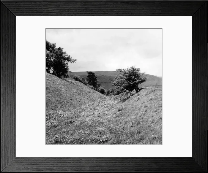 Framed Print : Offas Dyke is a large linear earthwork that roughly follows the current border Framed Print : Offas Dyke is a large linear earthwork that roughly follows the current border