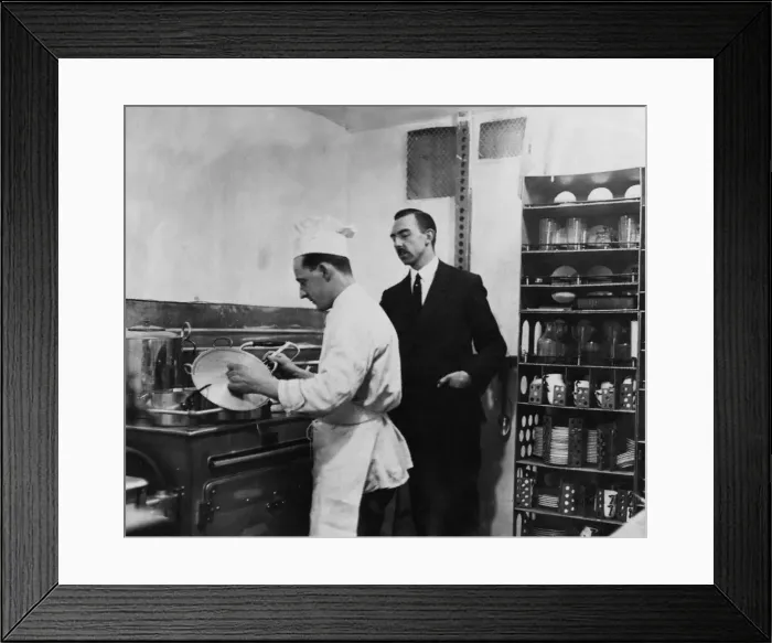 Framed Print : Eric Anderson Graham cook aboard the R101 seen here preparing a meal for the crew Framed Print : Eric Anderson Graham cook aboard the R101 seen here preparing a meal for the crew