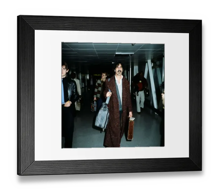 Framed Print : Frank Zappa at Heathrow Airport. 5th January 1983 Framed Print : Frank Zappa at Heathrow Airport. 5th January 1983