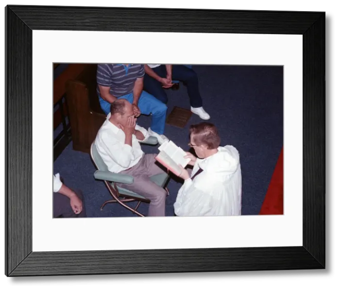 Framed Print : William Ramsey from Southend-on-Sea in the UK being exorcised by Bishop Robert McKenna Framed Print : William Ramsey from Southend-on-Sea in the UK being exorcised by Bishop Robert McKenna