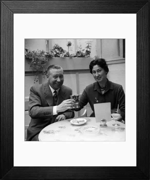 Framed Print : George Formby and fiancee Pat Howsen of Preston. She is wearing the huge solitaire Framed Print : George Formby and fiancee Pat Howsen of Preston. She is wearing the huge solitaire