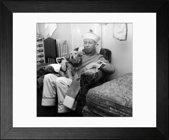 Framed Print : The show must go on, says George Formby, appearing as Mr Wu in Aladdin Framed Print : The show must go on, says George Formby, appearing as Mr Wu in Aladdin