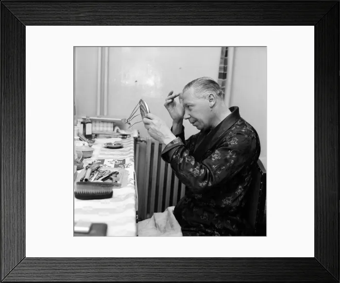 Framed Print : The show must go on, says George Formby, appearing as Mr Wu in Aladdin Framed Print : The show must go on, says George Formby, appearing as Mr Wu in Aladdin