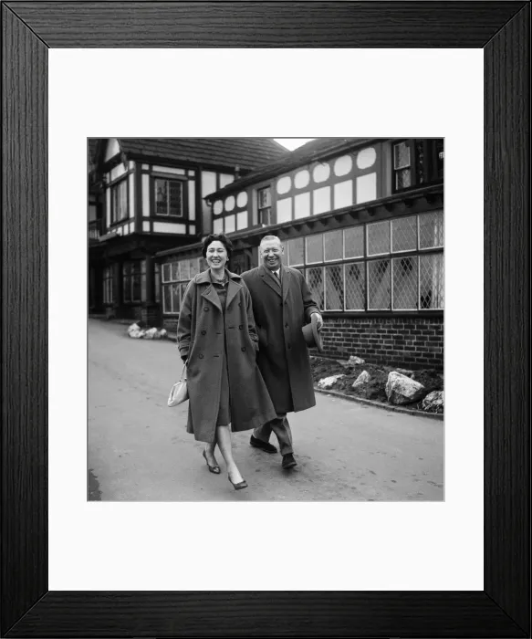 Framed Print : George Formby and fiancee Pat Howsen of Preston. She is wearing the huge solitaire