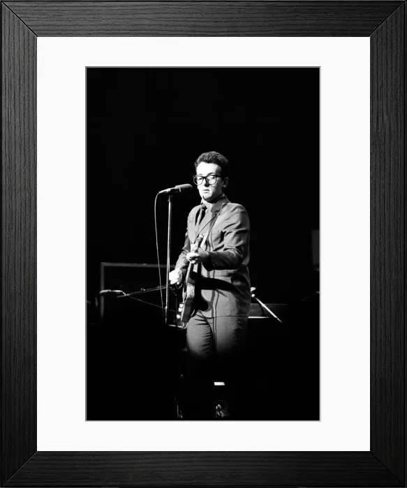 Framed Print : Elvis Costello on stage at Hammersmith Odeon, support act for Wings