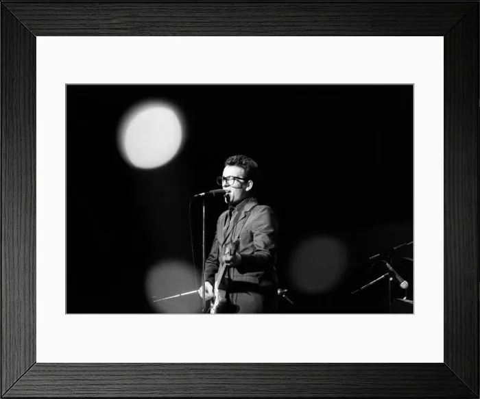 Framed Print : Elvis Costello on stage at Hammersmith Odeon, support act for Wings