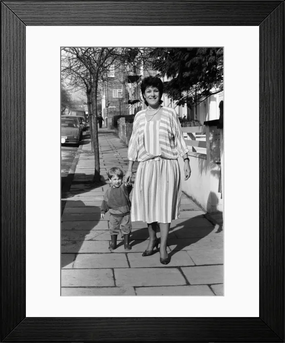 Framed Print : Lynda Bellingham at home in north London with her 22-month-old son Michael Framed Print : Lynda Bellingham at home in north London with her 22-month-old son Michael
