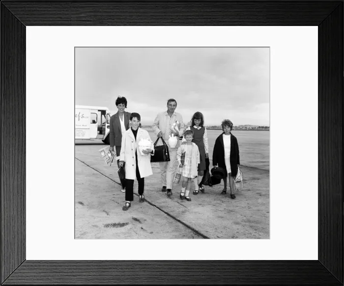 Framed Print : Spike Milligan and family back from a three week holiday in Marbella Framed Print : Spike Milligan and family back from a three week holiday in Marbella