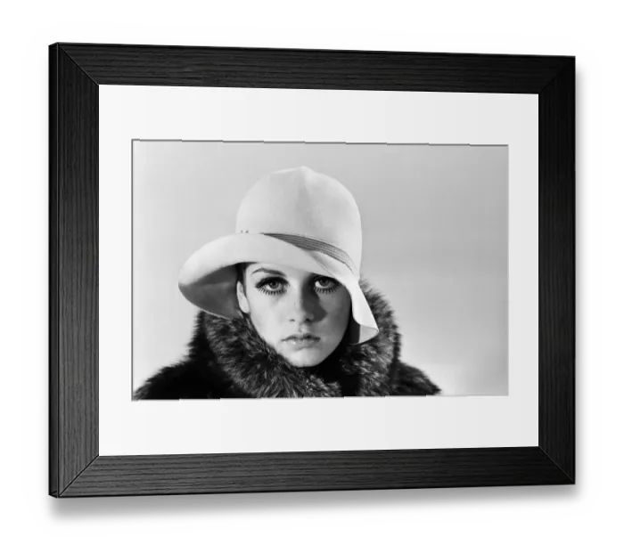 Framed Print : Model Twiggy posing in the studio wearing a hat. December 1966