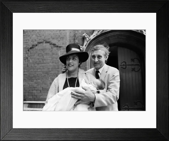Framed Print : Spike Milligan with wife Paddy holding their new arrival, Jane Fionulla Marion Framed Print : Spike Milligan with wife Paddy holding their new arrival, Jane Fionulla Marion