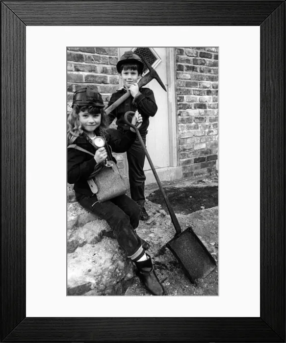 Framed Print : Two budding miners - Kelly Plews, left, and Martin Robinson - pose outside the Tom Framed Print : Two budding miners - Kelly Plews, left, and Martin Robinson - pose outside the Tom