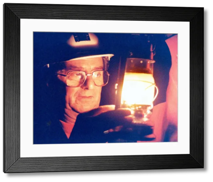 Framed Print : Mine manager Alan Chilton lights the way forward at the Tom Leonard Mining Museum Framed Print : Mine manager Alan Chilton lights the way forward at the Tom Leonard Mining Museum