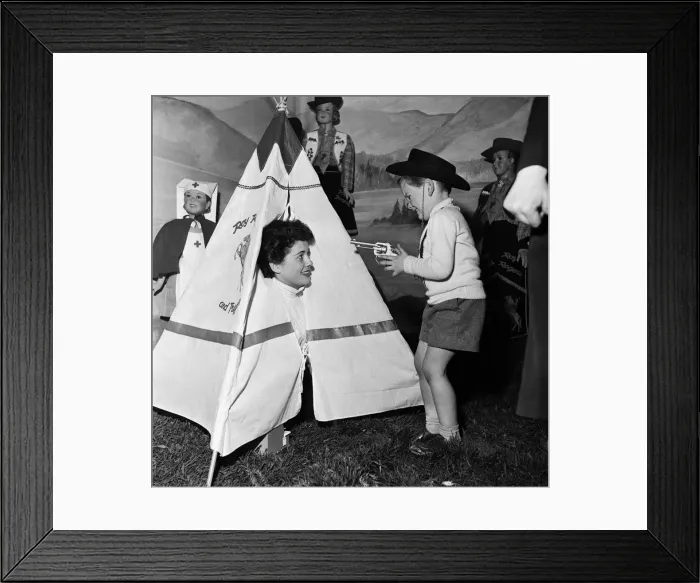 Framed Print : Micheal Mullaby playing with toys in a large store. 13th May 1954 Framed Print : Micheal Mullaby playing with toys in a large store. 13th May 1954