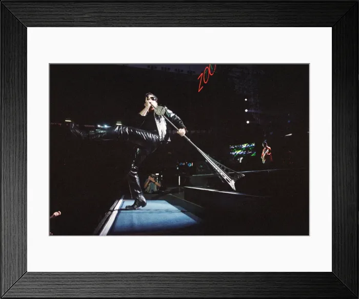Framed Print : Rock group U2 performing on stage at Cardiff Arms Park led by singer Bono