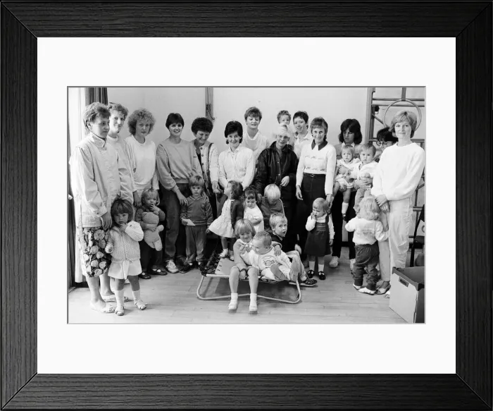 Framed Print : Getting to know each other are these mothers and toddlers who met at a new club held for Framed Print : Getting to know each other are these mothers and toddlers who met at a new club held for