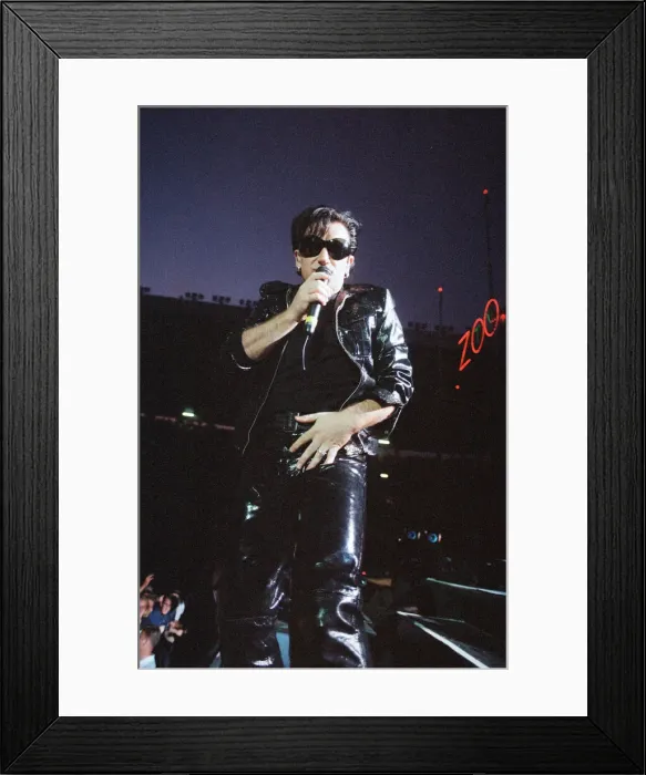 Framed Print : Rock group U2 performing on stage at Cardiff Arms Park led by singer Bono Framed Print : Rock group U2 performing on stage at Cardiff Arms Park led by singer Bono