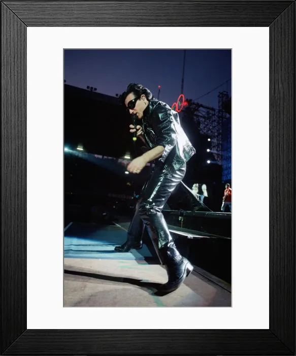 Framed Print : Rock group U2 performing on stage at Cardiff Arms Park led by singer Bono Framed Print : Rock group U2 performing on stage at Cardiff Arms Park led by singer Bono