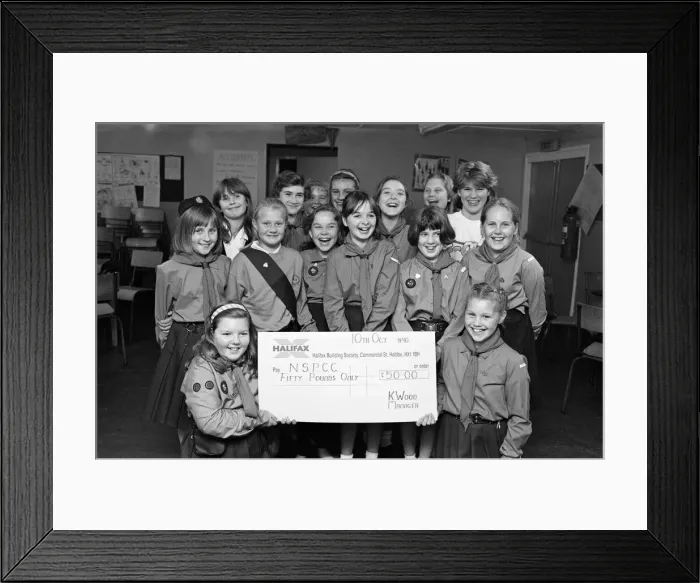 Framed Print : Breaking their silence to present 50 to the NSPCC were these Girl Guides Framed Print : Breaking their silence to present 50 to the NSPCC were these Girl Guides