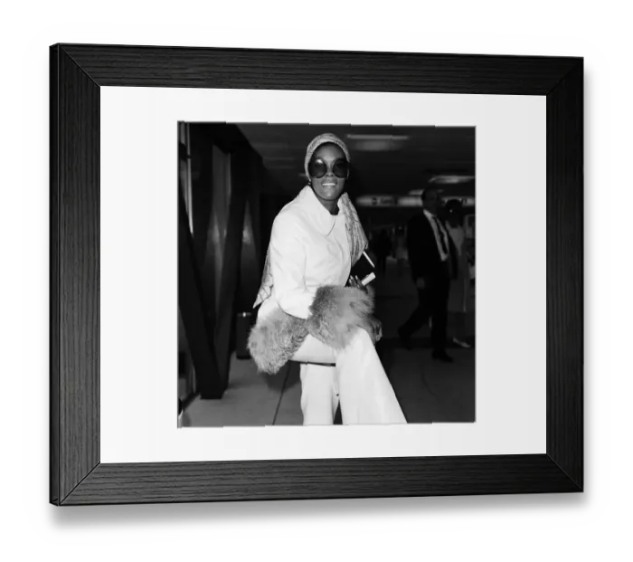 Framed Print : American singer Dionne Warwick at Heathrow Airport. 12th April 1970 Framed Print : American singer Dionne Warwick at Heathrow Airport. 12th April 1970