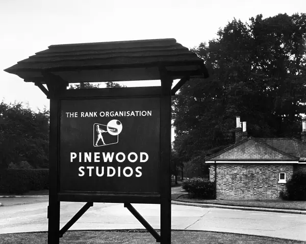 Exterior view showing the sign at Pinewood film studios at Iver Heath, Buckinghamshire