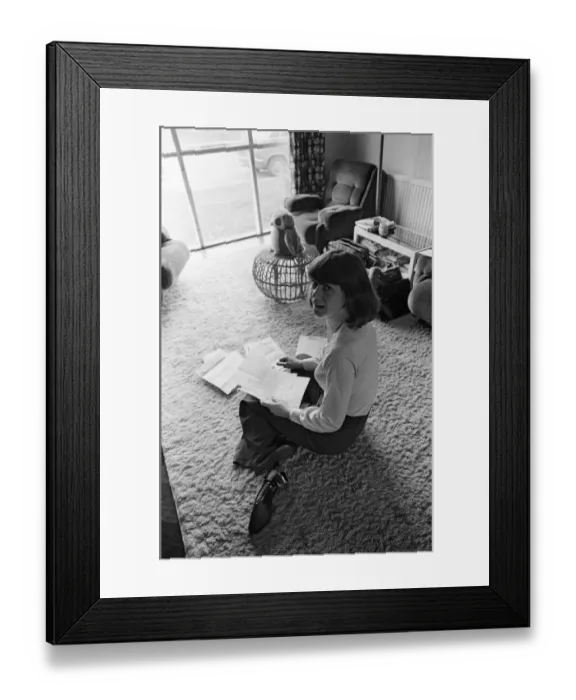 Framed Print : Pam Ayres replies to fan mail in her lounge at her home in a village in Oxfordshire