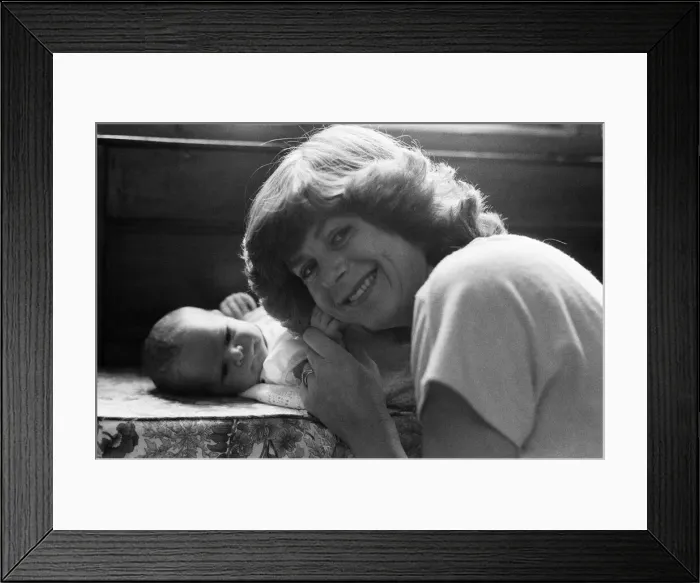 Framed Print : Poet Pam Ayres is pictured with her newborn baby James. 3rd August 1984 Framed Print : Poet Pam Ayres is pictured with her newborn baby James. 3rd August 1984