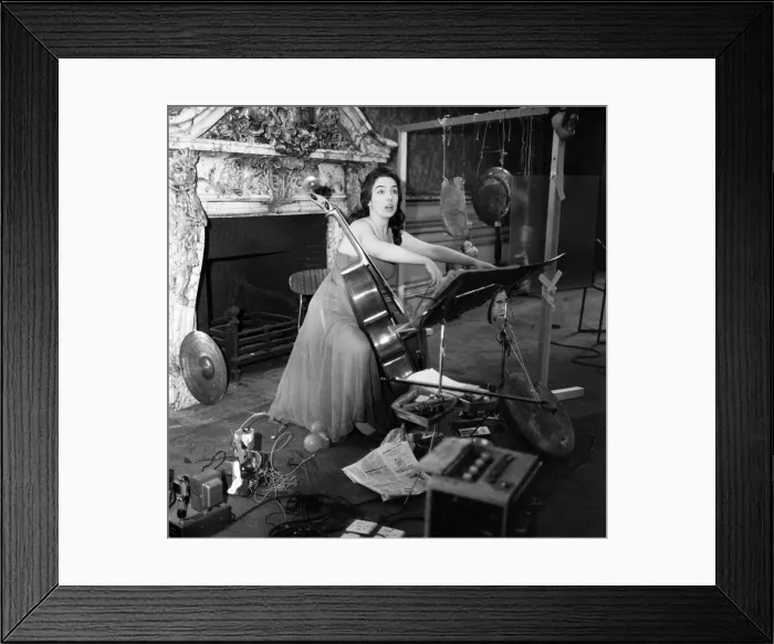 Framed Print : Cellist Charlotte Moorman rehearsing at 18 Carlton House Terrace for her particular sound