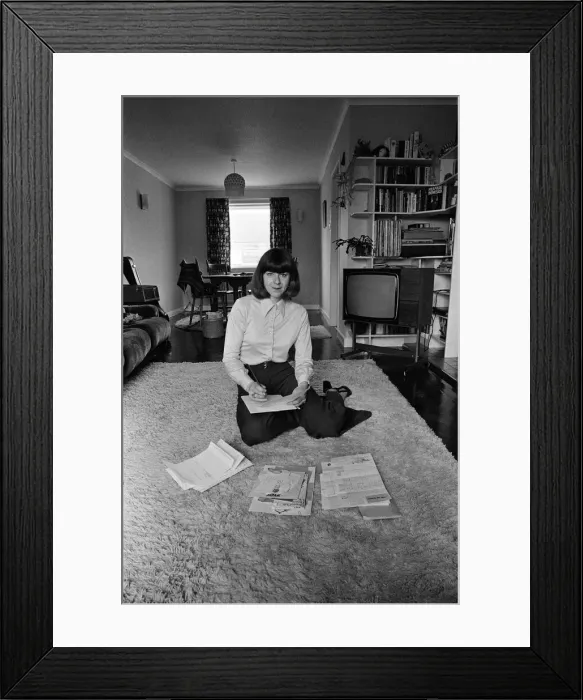 Framed Print : Pam Ayres replies to fan mail in her lounge at her home in a village in Oxfordshire