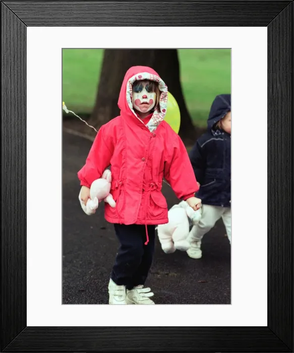 Framed Print : Youngsters dressed for the wet weather during the Great Toddle for Children in Need Framed Print : Youngsters dressed for the wet weather during the Great Toddle for Children in Need
