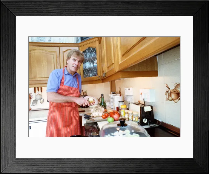 Framed Print : BBC Radio Cleveland presenter Colin Bunyan preparing a meal in his kitchen Framed Print : BBC Radio Cleveland presenter Colin Bunyan preparing a meal in his kitchen