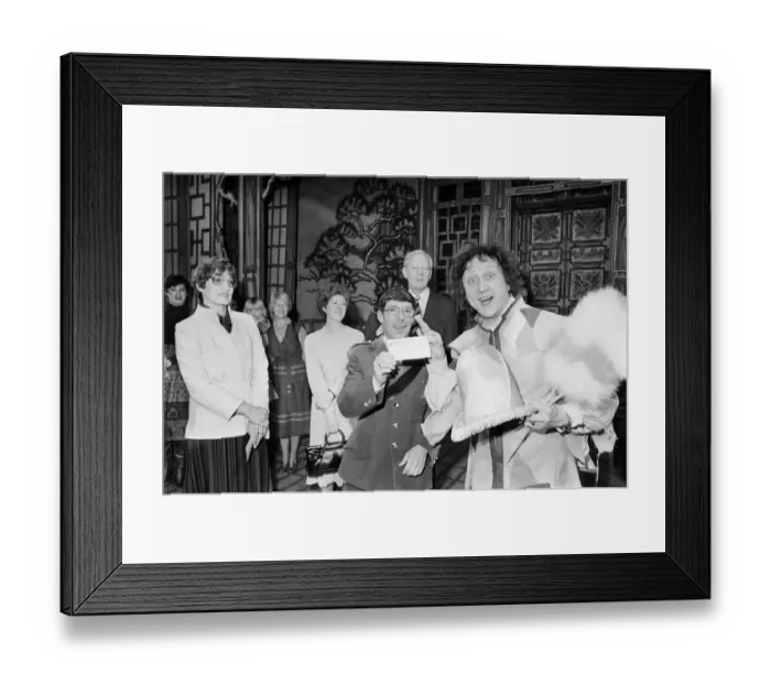 Framed Print : Ken Dodd, Comedian, presents 1000 pound cheque to the British Heart Foundation, Coventry Framed Print : Ken Dodd, Comedian, presents 1000 pound cheque to the British Heart Foundation, Coventry
