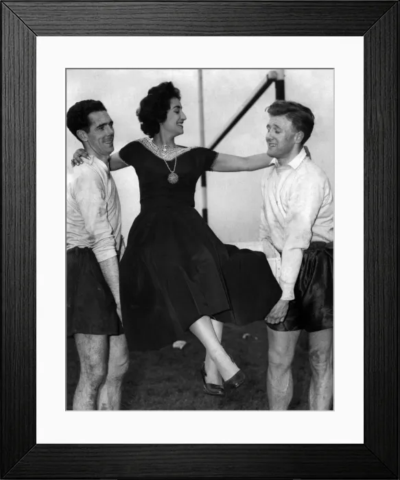 Framed Print : After finishing training the Wales football team received a case of oranges from Framed Print : After finishing training the Wales football team received a case of oranges from