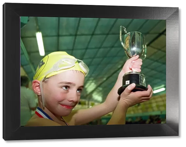 Action at the Guisborough Swimming Club Gala - Winner Christopher Wilkinson showing off
