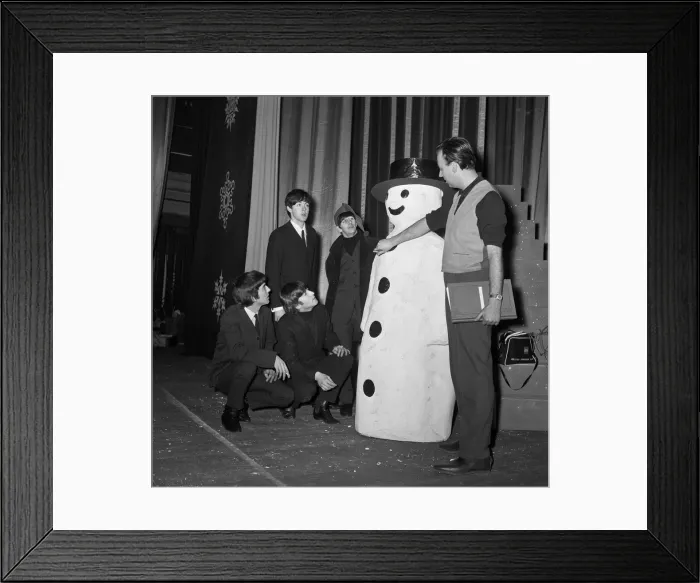 Framed Print : The Beatles pose with a Snowman, as they take a break from rehearsals at the Astoria Framed Print : The Beatles pose with a Snowman, as they take a break from rehearsals at the Astoria