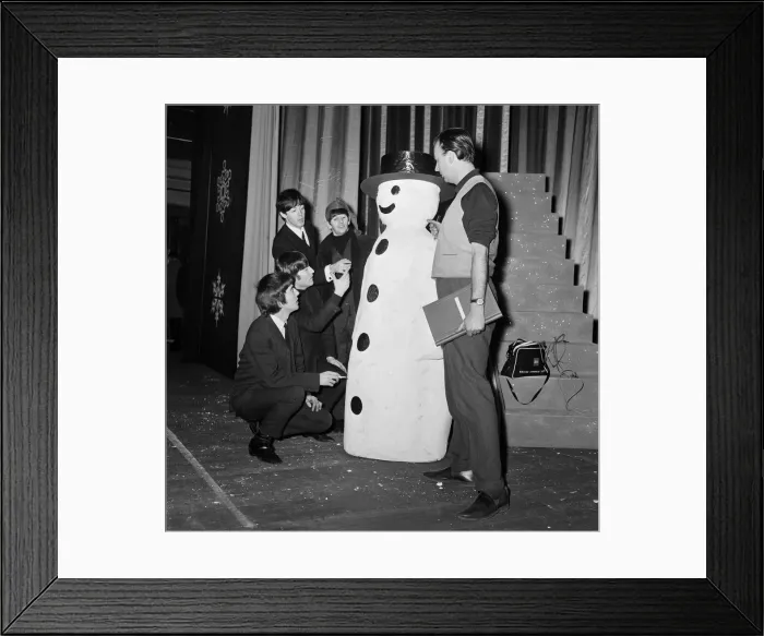 Framed Print : The Beatles pose with a Snowman, as they take a break from rehearsals at the Astoria