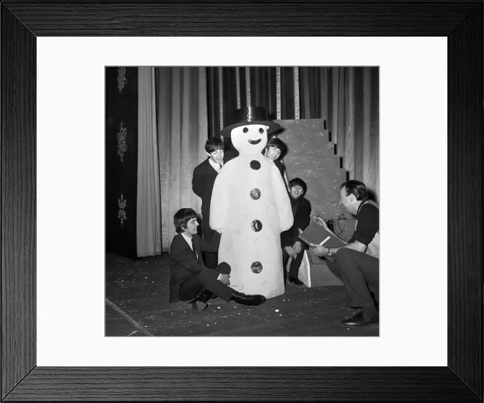 Framed Print : The Beatles pose with a Snowman, as they take a break from rehearsals at the Astoria Framed Print : The Beatles pose with a Snowman, as they take a break from rehearsals at the Astoria
