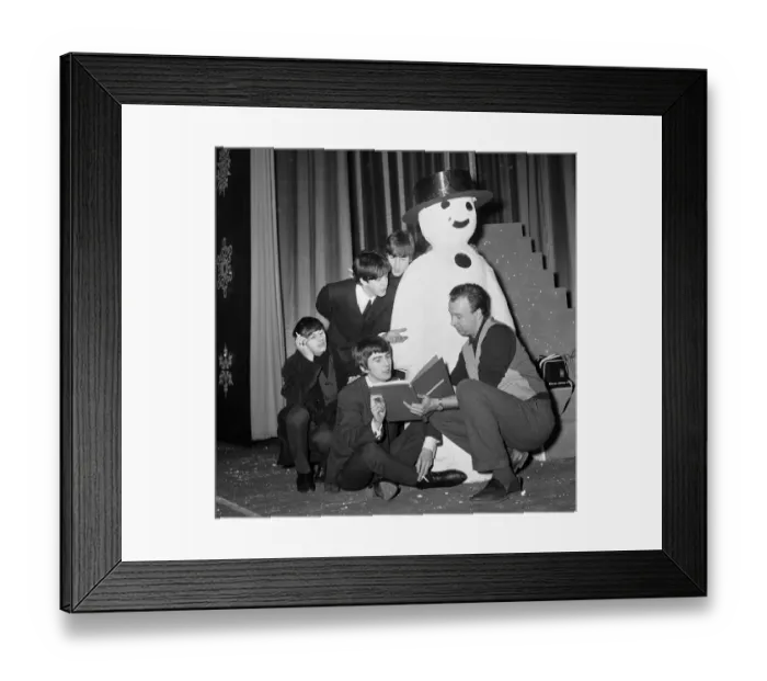 Framed Print : The Beatles pose with a Snowman, as they take a break from rehearsals at the Astoria Framed Print : The Beatles pose with a Snowman, as they take a break from rehearsals at the Astoria