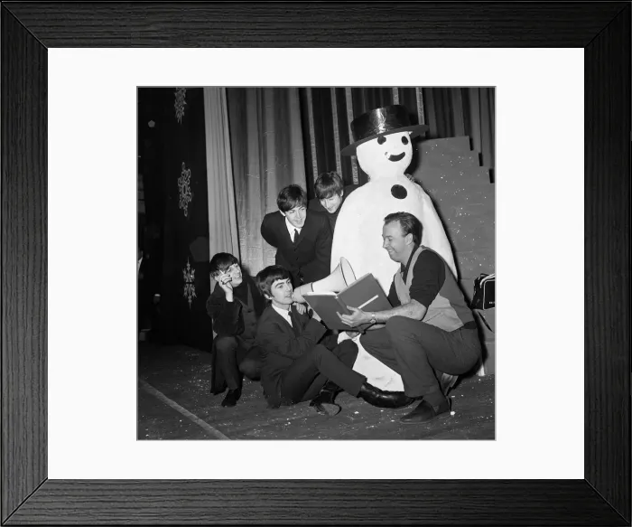 Framed Print : The Beatles pose with a Snowman, as they take a break from rehearsals at the Astoria Framed Print : The Beatles pose with a Snowman, as they take a break from rehearsals at the Astoria