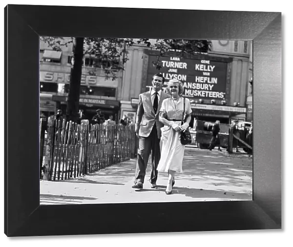 Angela Lansbury and Peter Shaw, pictured walking in Leicester Square