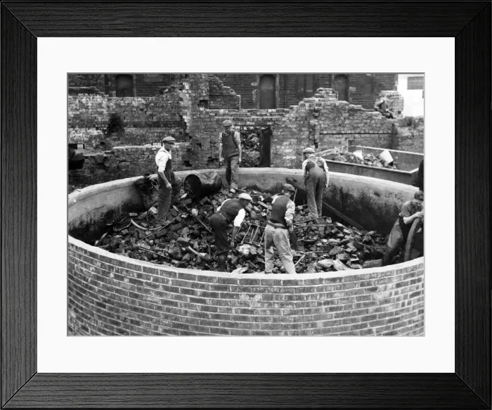 Framed Print : An Emergency Water Supply dam, which people have filled with debris such as bedsteads