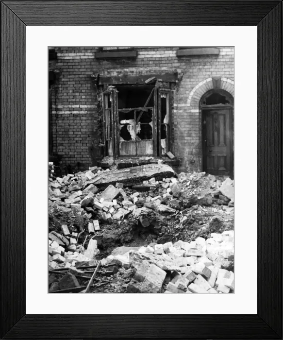Framed Print : Bomb damage in Liverpool. A large crater in Stevenson Street, Liverpool Framed Print : Bomb damage in Liverpool. A large crater in Stevenson Street, Liverpool