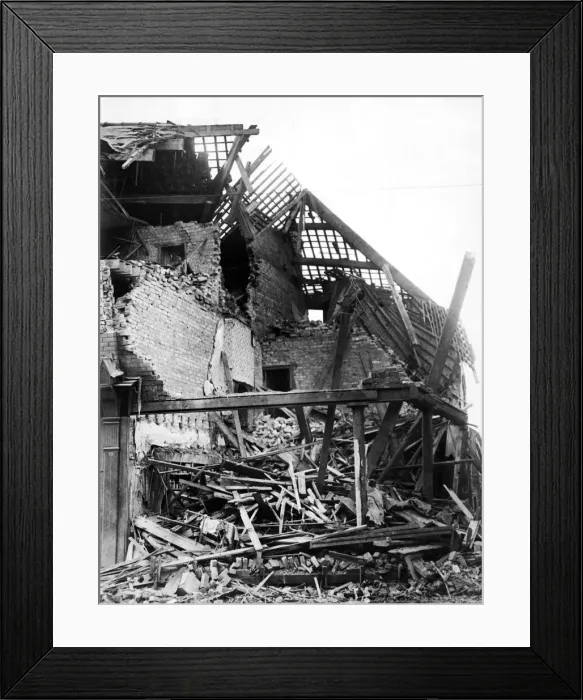 Framed Print : Bomb damage in Wavertree Road, Liverpool. This shop and house was the victim of a direct Framed Print : Bomb damage in Wavertree Road, Liverpool. This shop and house was the victim of a direct