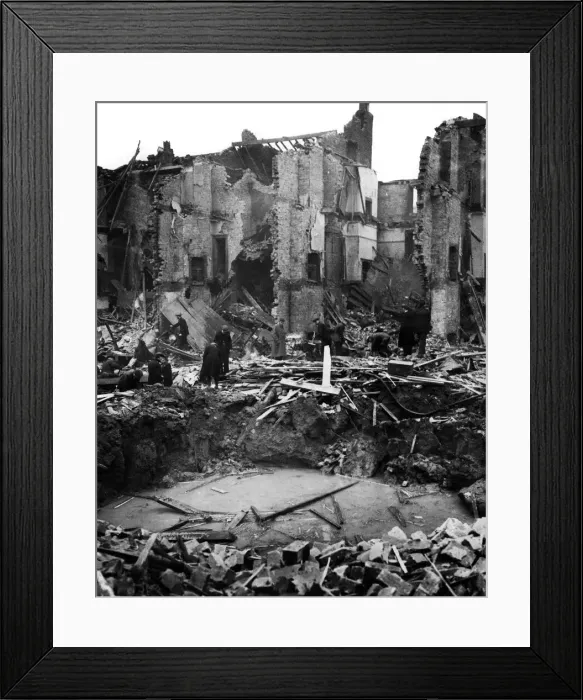 Framed Print : The Nazis indiscriminate bombing results in damage being done to dwelling houses in a Framed Print : The Nazis indiscriminate bombing results in damage being done to dwelling houses in a