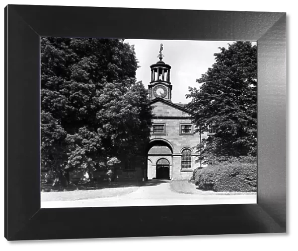 Clock tower entrance to the stables at Ormesby Hall. 17th February 1962